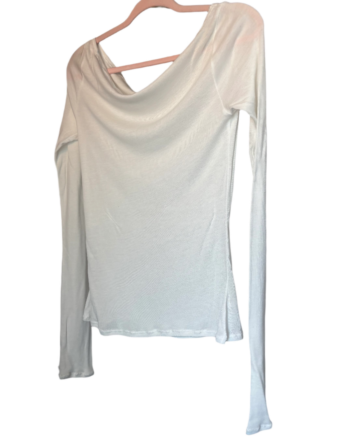 White long-sleeve top on a hanger against a plain background