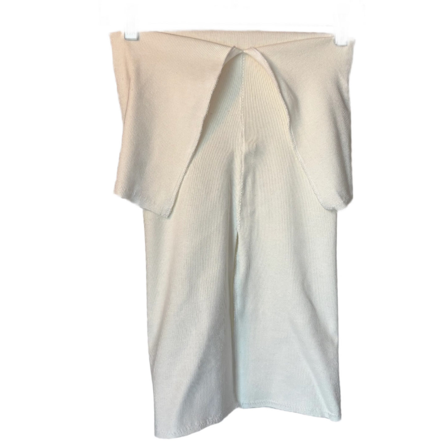 White shirt on a hanger against a plain background
