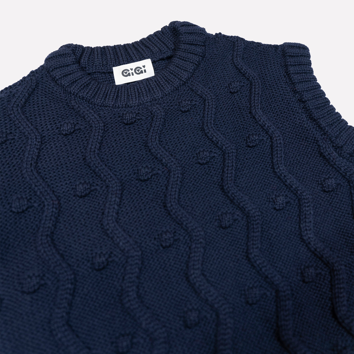 Navy merino wool sweater vest with zig-zags and mini pom-poms - view 6