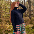 Navy merino wool cable knit turtleneck sweater