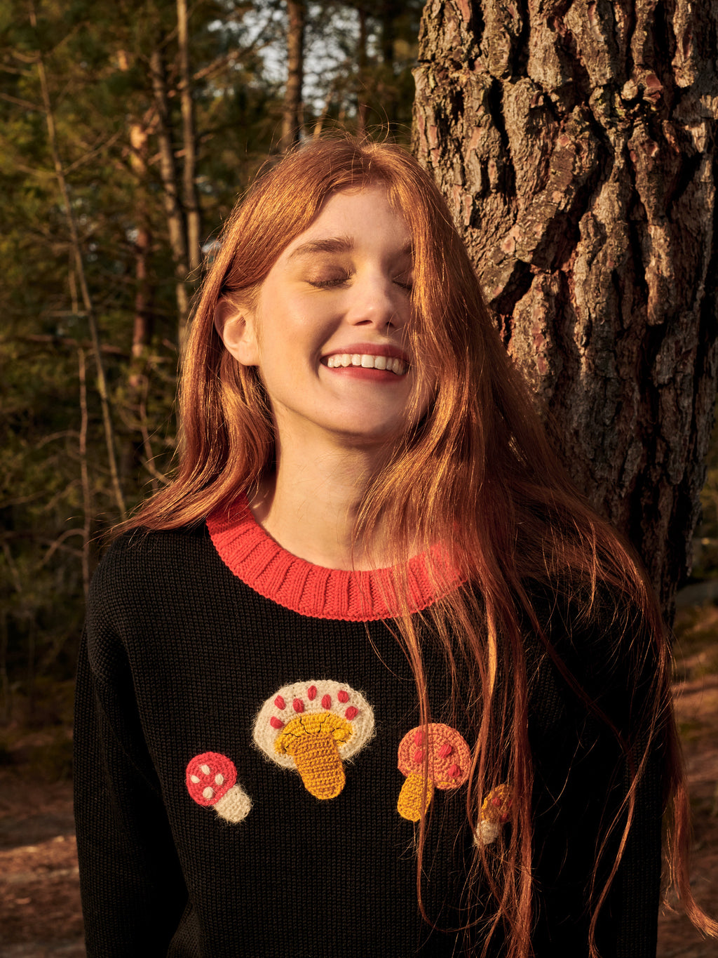 Black merino wool sweater with hand-crocheted mushrooms and red collar - view 3