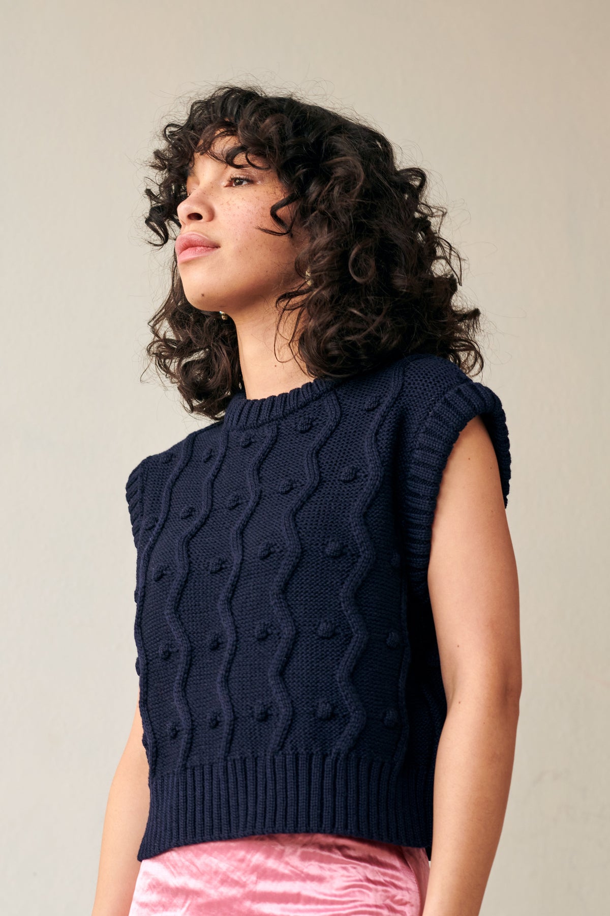 Navy merino wool sweater vest with zig-zags and mini pom-poms - view 5