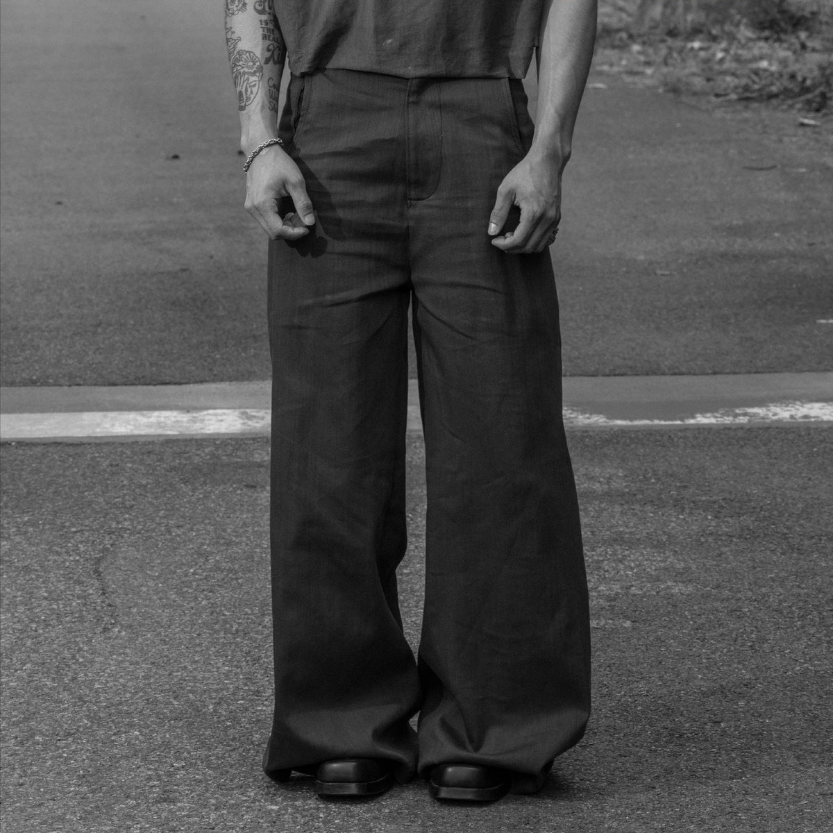 Dark grey high-rise slub twill denim trousers with subtle flare